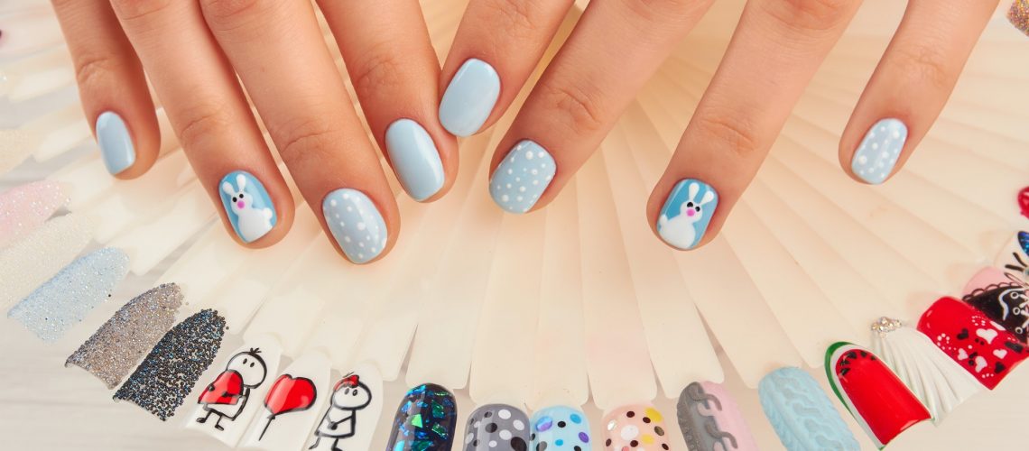 Manicured hands and nail art samples